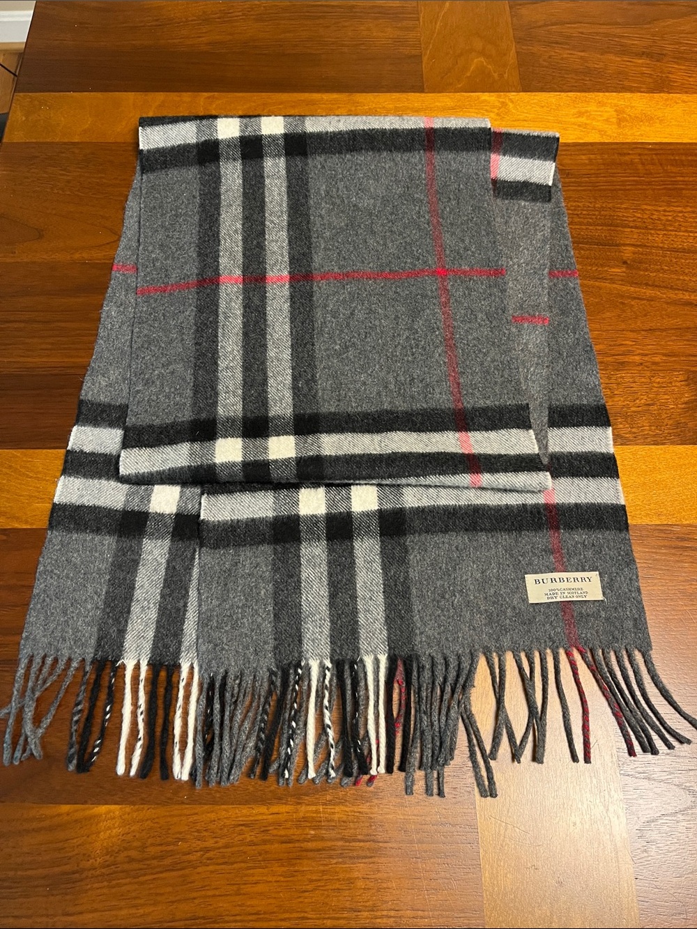 Burberry cashmere grey scarf, has some small holes
